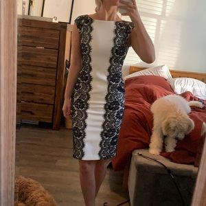 White dress with black lace and and accent belt